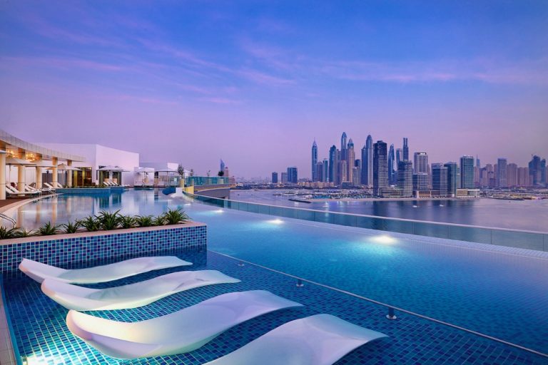 NH Collection Dubai The Palm - pool and skyline view